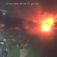 Settlers torch homes and cars during an assault on the Bedouin encampment of Khallet al-Sidra, near Mukhmas in the West Bank, January 17, 2026. (Screenshot)