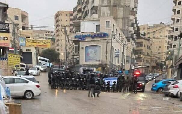 Police arrest dozens, seize weapons and fake products in East Jerusalem operation