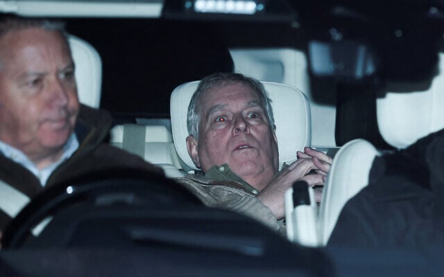 Andrew Mountbatten Windsor, younger brother of Britain’s King Charles, formerly known as Prince Andrew, leaves Aylsham Police Station in a vehicle, on the day he was arrested on suspicion of misconduct in public office, in Aylsham, Britain, February 19, 2026. (REUTERS/Phil Noble)