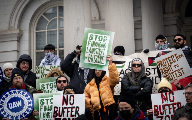 Activists protest against New York City legislation meant to protect houses of worship, at City Hall in New York City, February 25, 2026. (Luke Tress/Times of Israel