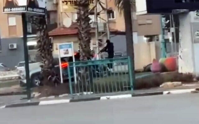The perpetrator of a fatal shooting in Lod is seen on video before shooting three men in a car, killing one, on January 31, 2026. (Screenshot/X) The perpetrator of a fatal shooting in Lod is seen on video before shooting three men in a car, killing one, on January 31, 2026. (Screenshot/X)