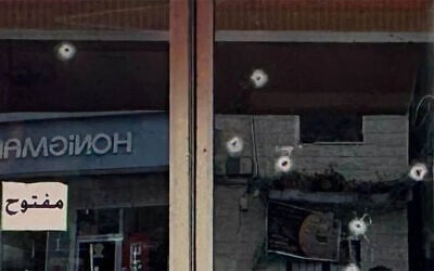 A storefront that had been shot at during an evening spate of violence in the northern Arab town of Kafr Kanna, photo taken on February 22, 2026. (Charlie Summers/Times of Israel) A storefront that had been shot at during an evening spate of violence in the northern Arab town of Kafr Kanna, photo taken on February 22, 2026. (Charlie Summers/Times of Israel)