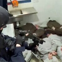 Screen capture from video of Palestinian prisoners seen during a video filmed when National Security Minister Itamar Ben Gvir visited the Ofer Prison on February 13, 2026. (X)