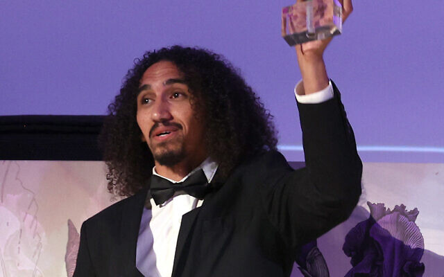 File: Palestinian film director Abdallah Al-Khatib after receiving the Best Feature Length Arab Documentary Award for 'Little Palestine, Diary of a Siege' at the closing ceremony of the 3rd edition of the Amman International Film Festival, on July 27, 2022 (by PATRICK BAZ / Amman International Film Festival (AIFF) / AFP)