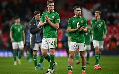 Irish players applaud fans following the UEFA Nations League match between England and the Republic of Ireland at Wembley Stadium in London on November 17, 2024. (Ben STANSALL / AFP)