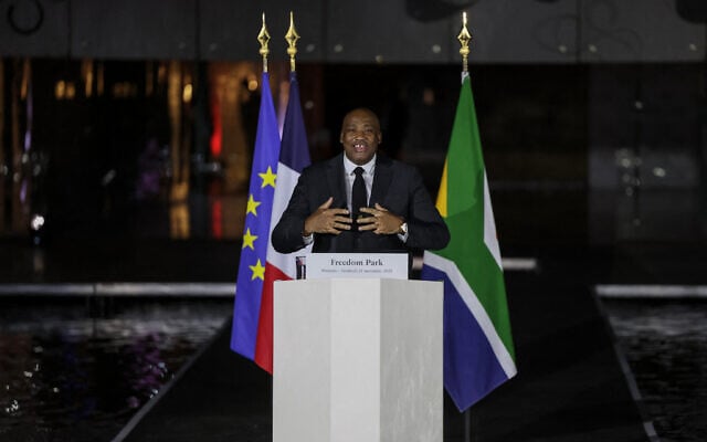 South Africa's Minister of Sports, Arts and Culture Gayton McKenzie (C) speaks as he attends a commemoration ceremony, for French individuals who fought against apartheid, with South Africa's Deputy President Paul Mashatile and Frances President Emmanuel Macron at Freedom Park in Pretoria on November 21, 2025 ahead of the G20 leaders' Summit. (Photo by Ludovic MARIN / AFP) South Africa's Minister of Sports, Arts and Culture Gayton McKenzie (C) speaks as he attends a commemoration ceremony, for French individuals who fought against apartheid, with South Africa's Deputy President Paul Mashatile and Frances President Emmanuel Macron at Freedom Park in Pretoria on November 21, 2025 ahead of the G20 leaders' Summit. (Photo by Ludovic MARIN / AFP)