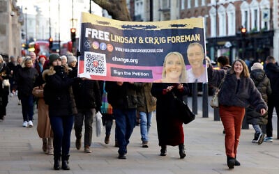 Family and supporters of Lindsay and Craig Foreman, a British couple detained in Iran, march in London on January 3, 2026, to raise national awareness of the couple's ongoing detention and the need for urgent intervention. (Brook Mitchell / AFP)