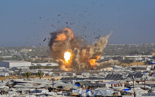 Smoke and fire rises after an Israeli airstrike in the west of Khan Younis, southern Gaza Strip on January 31, 2026 (Bashar Taleb / AFP)