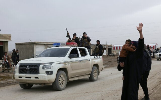Residents cheer as Syrian government internal security forces enter the northeastern Syrian city of Hasakeh on February 2, 2026. (Bakr ALkasem / AFP) Residents cheer as Syrian government internal security forces enter the northeastern Syrian city of Hasakeh on February 2, 2026. (Bakr ALkasem / AFP)