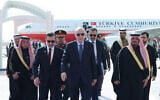 Turkey's President Recep Tayyip Erdogan (C) walks with Saudi officials upon his arrival in Riyadh on February 3, 2026. (TURKISH PRESIDENCY PRESS OFFICE / AFP)