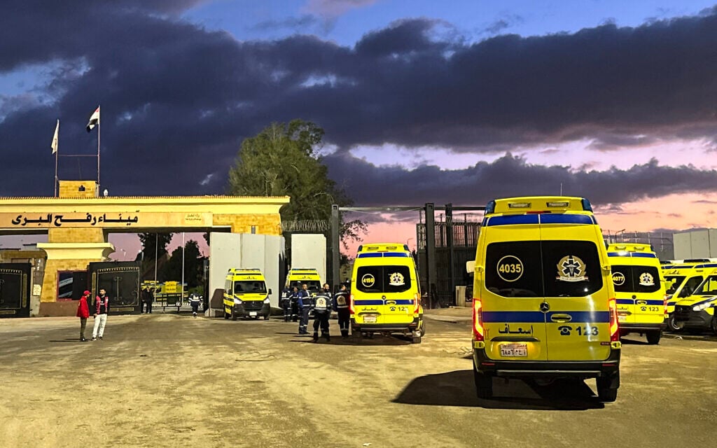 Ambulances wait on the Egyptian side of the Rafah Crossing with the Gaza Strip on February 4, 2026, days after Israel permitted a limited reopening of the Palestinian territory's border post. (AFP) Ambulances wait on the Egyptian side of the Rafah Crossing with the Gaza Strip on February 4, 2026, days after Israel permitted a limited reopening of the Palestinian territory's border post. (AFP)