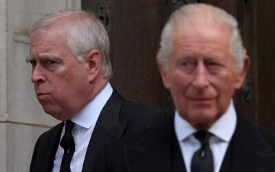 FILES: Britain's then-prince Andrew, and King Charles III leave following a requiem mass, a Catholic funeral service, for the late Katharine, Duchess of Kent, at Westminster Cathedral in London on September 16, 2025. (Adrian Dennis / AFP)
