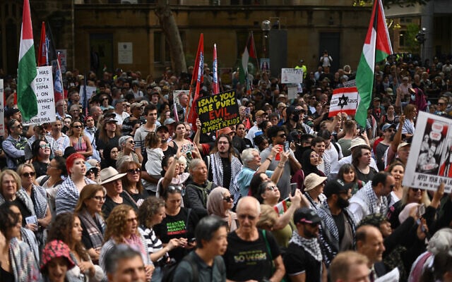 Pro-Palestinian, anti-Israel protesters take part in a demonstration against President Isaac Herzog's visit to Australia in Sydney on February 9, 2026. (Photo by Saeed Khan / AFP) Pro-Palestinian, anti-Israel protesters take part in a demonstration against President Isaac Herzog's visit to Australia in Sydney on February 9, 2026. (Photo by Saeed Khan / AFP)