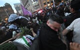 Police deploy pepper spray to disperse pro-Palestinian, anti-Israel protesters taking part in a rally against President Isaac Herzog's visit to Australia in Sydney on February 9, 2026. (Saeed Khan / AFP)