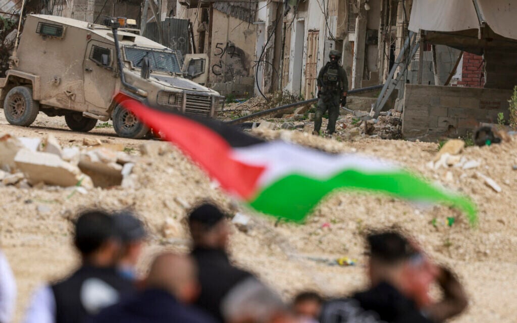 Palestinians protest as Israeli soldiers operate in the Nur Shams Palestinian refugee camp in the West Bank on February 9, 2026. (Jaafar ASHTIYEH / AFP) Palestinians protest as Israeli soldiers operate in the Nur Shams Palestinian refugee camp in the West Bank on February 9, 2026. (Jaafar ASHTIYEH / AFP)
