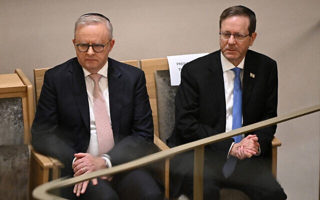 President Isaac Herzog (R) and Australia's Prime Minister Anthony Albanese attend a service and meet with victims of the Bondi terror attack and members of the local Jewish community at the Chabad of Bondi in Sydney on February 10, 2026. (BIANCA DE MARCHI / POOL / AFP) President Isaac Herzog (R) and Australia's Prime Minister Anthony Albanese attend a service and meet with victims of the Bondi terror attack and members of the local Jewish community at the Chabad of Bondi in Sydney on February 10, 2026. (BIANCA DE MARCHI / POOL / AFP)