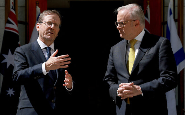 Australia's Prime Minister Anthony Albanese (R) receives President Isaac Herzog at the Parliament House in Canberra on February 11, 2026. (Photo by DAVID GRAY / AFP) Australia's Prime Minister Anthony Albanese (R) receives President Isaac Herzog at the Parliament House in Canberra on February 11, 2026. (Photo by DAVID GRAY / AFP)