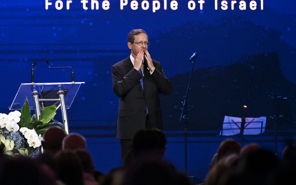 President Isaac Herzog reacts during a Jewish community event in Melbourne on February 12, 2026. (WILLIAM WEST / AFP) President Isaac Herzog reacts during a Jewish community event in Melbourne on February 12, 2026. (WILLIAM WEST / AFP)