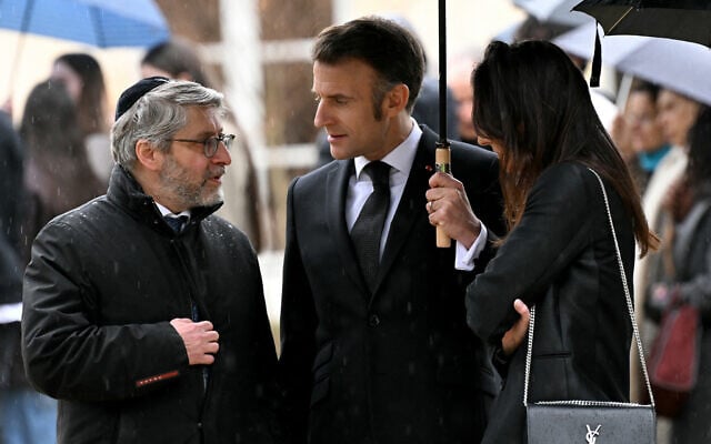 (From L) Chief Rabbi of France Haim Korsia, France's President Emmanuel Macron and Anne-Laure Abitbol, sister of Ilan Halimi, a French Jew who was tortured and murdered in 2006, attend a ceremony commemorating the 20th anniversary of his murder at The Elysee Presidential Palace in Paris on February 13, 2026. (Bertrand GUAY / POOL / AFP) (From L) Chief Rabbi of France Haim Korsia, France's President Emmanuel Macron and Anne-Laure Abitbol, sister of Ilan Halimi, a French Jew who was tortured and murdered in 2006, attend a ceremony commemorating the 20th anniversary of his murder at The Elysee Presidential Palace in Paris on February 13, 2026. (Bertrand GUAY / POOL / AFP)