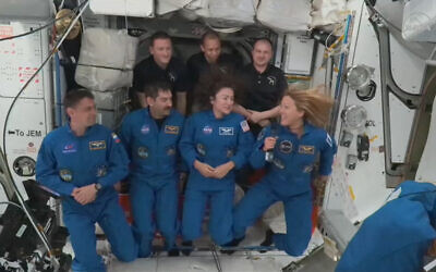 This still image from a NASA livestream shows Crew-12 answering questions during a livestream aboard the International Space Station on February 14, 2026. (HANDOUT / NASA / AFP)