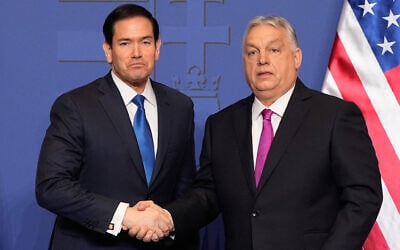 Hungary's Prime Minister Viktor Orban, right, shakes hands with US Secretary of State Marco Rubio after a joint press conference following talks during a visit in Budapest, Hungary, on February 16, 2026. (Alex Brandon / Pool AP / AFP)