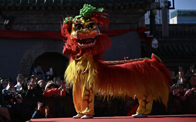 Illustrative: Lion dancers perform at Dongyue Temple on the first day of the Lunar New Year of the Horse in Beijing on February 17, 2026. (Pedro PARDO / AFP)