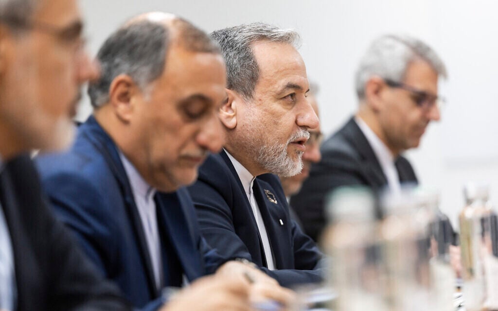 Iran's Foreign Minister Abbas Araghchi speaks during a second round of US-Iranian talks, with Washington pushing Tehran to make a deal to limit its nuclear program, in Geneva on February 17, 2026. (CYRIL ZINGARO / POOL / AFP)
