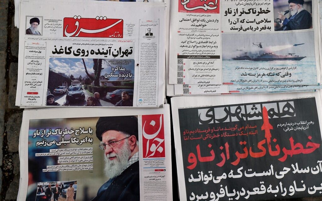 Daily Iranian newspapers are fronted with the image of Iran's Supreme Leader Ayatollah Ali Khamenei and other headlines, displayed at a kiosk in Tehran on February 18, 2026. (ATTA KENARE / AFP) Daily Iranian newspapers are fronted with the image of Iran's Supreme Leader Ayatollah Ali Khamenei and other headlines, displayed at a kiosk in Tehran on February 18, 2026. (ATTA KENARE / AFP)
