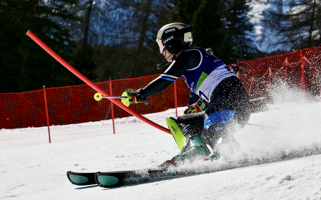 Israel's Noa Szollos competes in the first run of the women's slalom event during the Milano Cortina 2026 Winter Olympic Games at the Tofane Alpine Skiing Centre in Cortina d'Ampezzo on February 18, 2026 (Stefano RELLANDINI / AFP) Israel's Noa Szollos competes in the first run of the women's slalom event during the Milano Cortina 2026 Winter Olympic Games at the Tofane Alpine Skiing Centre in Cortina d'Ampezzo on February 18, 2026 (Stefano RELLANDINI / AFP)