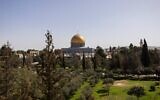 Olive and Cypress trees surround the Dome of the Rock Shrine on the Temple Mount, on the first day of the holy Muslim month of Ramadan, in the old city of Jerusalem on February 18, 2026. (Photo by ilia YEFIMOVICH / AFP)
