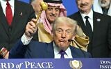 US President Donald Trump holds a gavel during a signing ceremony at the inaugural meeting of the "Board of Peace" at the US Institute of Peace in Washington, DC, on February 19, 2026. (SAUL LOEB / AFP)