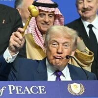 US President Donald Trump holds a gavel during a signing ceremony at the inaugural meeting of the "Board of Peace" at the US Institute of Peace in Washington, DC, on February 19, 2026. (SAUL LOEB / AFP)