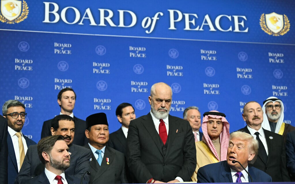 US President Donald Trump (R) speaks during a signing ceremony at the inaugural meeting of the Board of Peace at the US Institute of Peace in Washington, DC, on February 19, 2026. (SAUL LOEB / AFP)