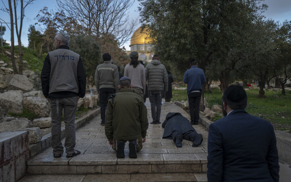 Religious Jews pray while visiting the Temple Mount in the old city of Jerusalem on February 24, 2026. (Photo by Ilia YEFIMOVICH / AFP) Religious Jews pray while visiting the Temple Mount in the old city of Jerusalem on February 24, 2026. (Photo by Ilia YEFIMOVICH / AFP)