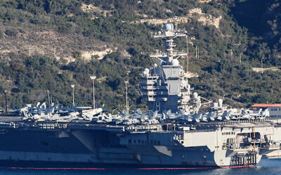 US aircraft carrier USS Gerald Ford is pictured docked at Souda Bay in the Greek Mediterranean island of Crete, on February 24, 2026. (Costas METAXAKIS / AFP)