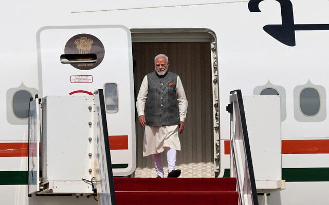 India's Prime Minister Narendra Modi disembarks from the plane upon his arrival at the Ben Gurion airport near Tel Aviv on February 25, 2026. (Jack GUEZ / AFP) India's Prime Minister Narendra Modi disembarks from the plane upon his arrival at the Ben Gurion airport near Tel Aviv on February 25, 2026. (Jack GUEZ / AFP)