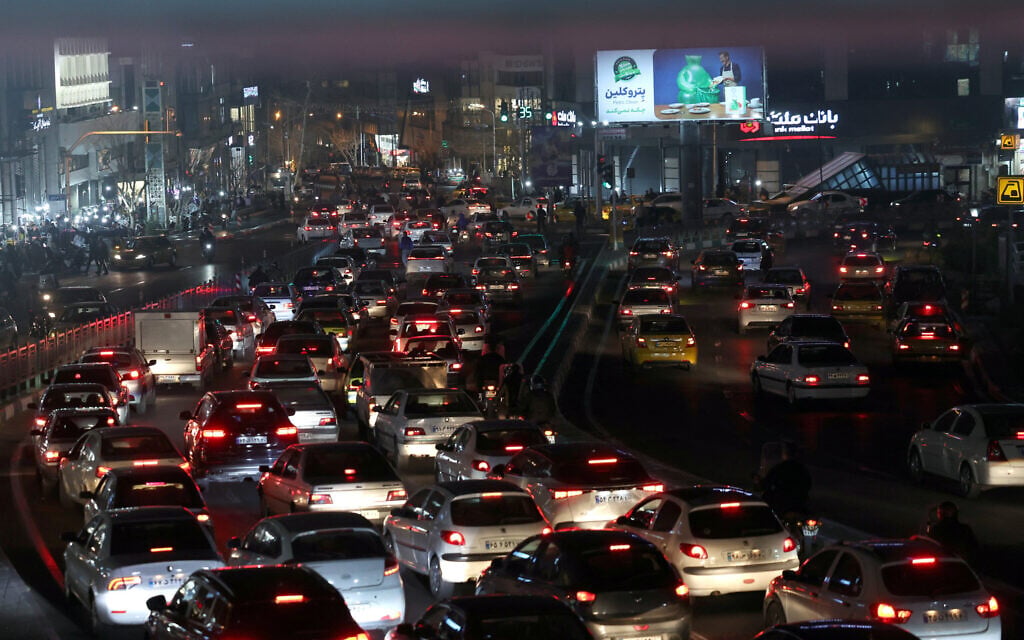 Vehicles drive in a traffic jam in downtown Tehran on February 25, 2026 (AFP) Vehicles drive in a traffic jam in downtown Tehran on February 25, 2026 (AFP)