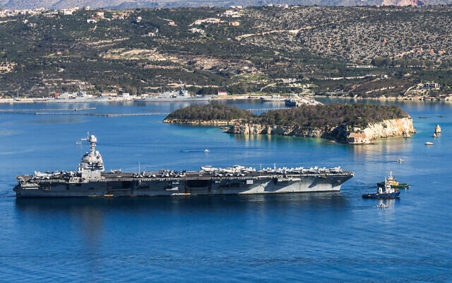 The US Navy aircraft carrier USS Gerald R. Ford, dispatched to the region amid tensions with Iran, departs Souda Bay on the Greek island of Crete on February 26, 2026. (Costas METAXAKIS / AFP) The US Navy aircraft carrier USS Gerald R. Ford, dispatched to the region amid tensions with Iran, departs Souda Bay on the Greek island of Crete on February 26, 2026. (Costas METAXAKIS / AFP)