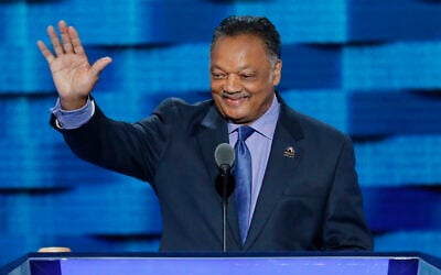 Reverend Jesse Jackson waves as he steps to the podium during the third day of the Democratic National Convention in Philadelphia, Pennsylvania, on July 27, 2016. (AP Photo/J. Scott Applewhite/File)