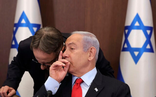 Prime Minister Benjamin Netanyahu, right, speaks with his chief of staff Tzachi Braverman during the weekly cabinet meeting at the Prime Minister's Office in Jerusalem, July 30, 2023. (Abir Sultan/Pool Photo via AP) Prime Minister Benjamin Netanyahu, right, speaks with his chief of staff Tzachi Braverman during the weekly cabinet meeting at the Prime Minister's Office in Jerusalem, July 30, 2023. (Abir Sultan/Pool Photo via AP)