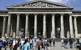 Visitors walk outside the British Museum in Bloomsbury, London, June 26, 2015. (AP/Tim Ireland)
