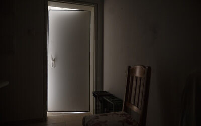 A reinforced door is seen in the safe room of Shlomo and Hanna’le Margalit  in  Kibbutz Nir Oz on September 26, 2024. The Margalits stayed in this room for 12 hours during the October 7, 2023, Hamas terror attack on southern Israel. (AP Photo/Leo Correa)