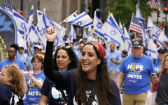Celebrants march in the 2025 Israel Day Parade on New York's Fifth Avenue, Sunday, May 18, 2025. (AP Photo/Richard Drew)
