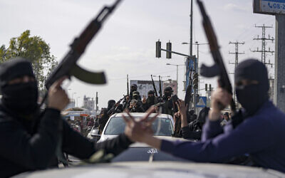 Members of the al-Qassam Brigades, the armed wing of Hamas, take part in a parade as they celebrate a ceasefire agreement between Hamas and Israel in Deir al-Balah, Gaza Strip, on January 19, 2025. (AP Photo/Abdel Kareem Hana, File) Members of the al-Qassam Brigades, the armed wing of Hamas, take part in a parade as they celebrate a ceasefire agreement between Hamas and Israel in Deir al-Balah, Gaza Strip, on January 19, 2025. (AP Photo/Abdel Kareem Hana, File)