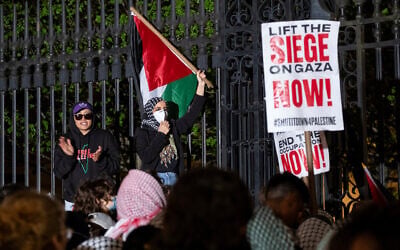 Leqaa Kordia, right, demonstrates with pro-Palestinian, anti-Israel protesters as they gather near a main gate at Columbia University in New York, April 30, 2024, just before New York City police officers cleared the area after a building was taken over by protesters earlier in the day. (AP/Craig Ruttle)