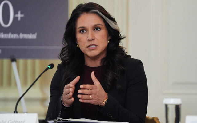 US Director of National Intelligence Tulsi Gabbard speaks in the State Dining Room of the White House, Oct. 23, 2025, in Washington (AP Photo/Evan Vucci)