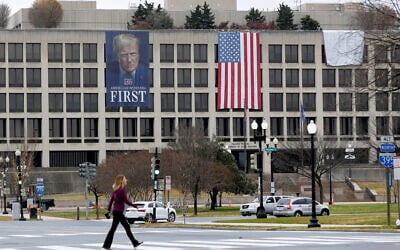 A portrait of US President Donald Trump hangs on the US Labor Department headquarters near the Capitol, on November 26, 2025, in Washington. (AP/Rahmat Gul)