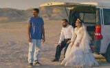 This image released by Neon shows, from left, Mohamad Ali Elyasmehr as Hamid, Majid Panahi as Ali, Hadis Pakbaten as Goli, in a scene from "It Was Just an Accident." (Neon via AP)