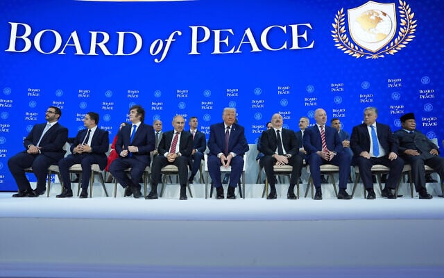 US President Donald Trump, center, poses with international leaders after the signing of a Gaza Board of Peace charter during the Annual Meeting of the World Economic Forum in Davos, Switzerland, January 22, 2026. (AP Photo/Evan Vucci) US President Donald Trump, center, poses with international leaders after the signing of a Gaza Board of Peace charter during the Annual Meeting of the World Economic Forum in Davos, Switzerland, January 22, 2026. (AP Photo/Evan Vucci)
