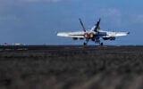 This handout image from the US Navy shows an EA-18G Growler launching from the flight deck of the Nimitz-class aircraft carrier USS Abraham Lincoln in the Indian Ocean on January 23, 2026. (Mass Communication Specialist Seaman Daniel Kimmelman/US Navy via AP)